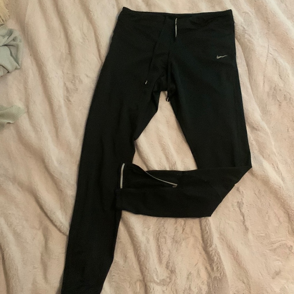 Nike leggings with zipper bottom, large